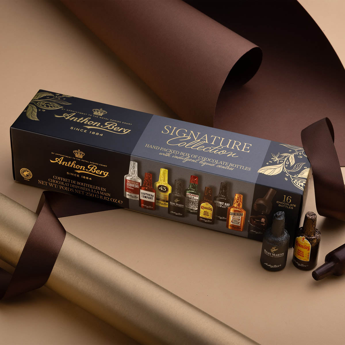 16 bottigliette di cioccolato ripiene di liquori assortiti | Anthon Berg | Cartone con 18 pezzi