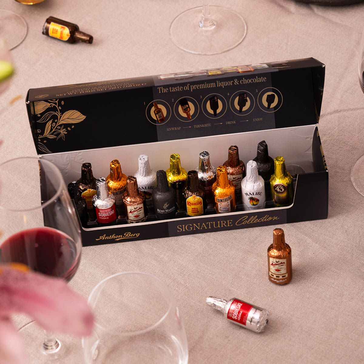 16 bottigliette di cioccolato ripiene di liquori assortiti | Anthon Berg | Cartone con 18 pezzi